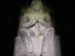 Buddha statue in the rays of light, india