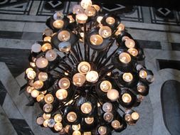 candles on wrought iron candlestick in florence dome, italy