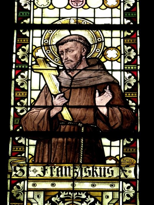 Stained-glass window with the image of a monk