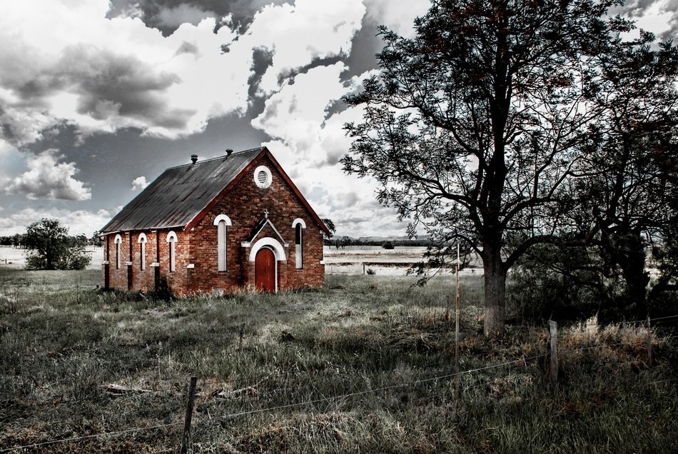 abandoned church among nature in monochrome image