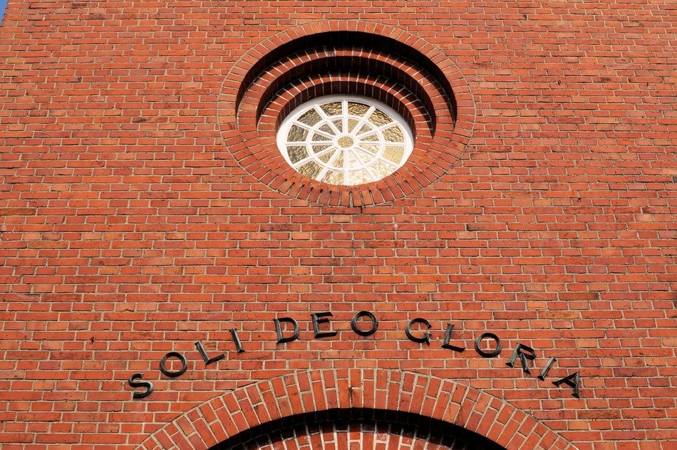 latin inscription on the church facade wall