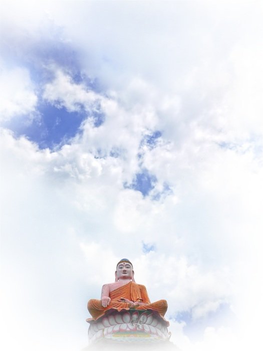 Buddhist statue on a background of white clouds