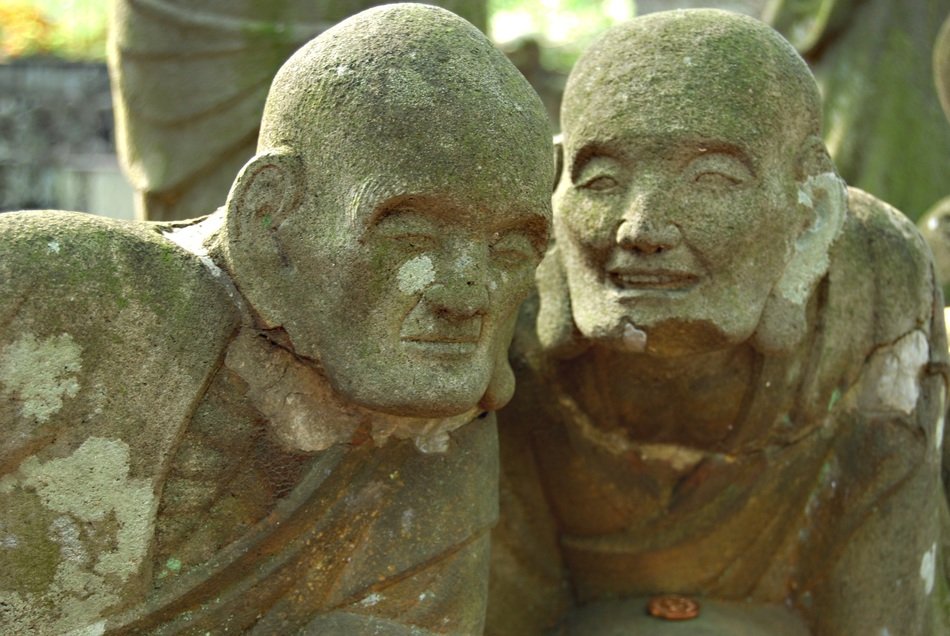 weathered stone Buddha statues