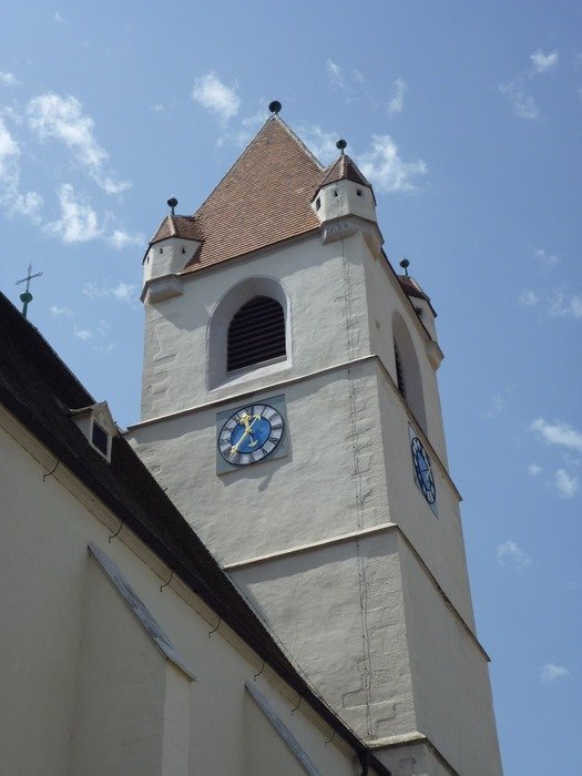 church tower with blue clock