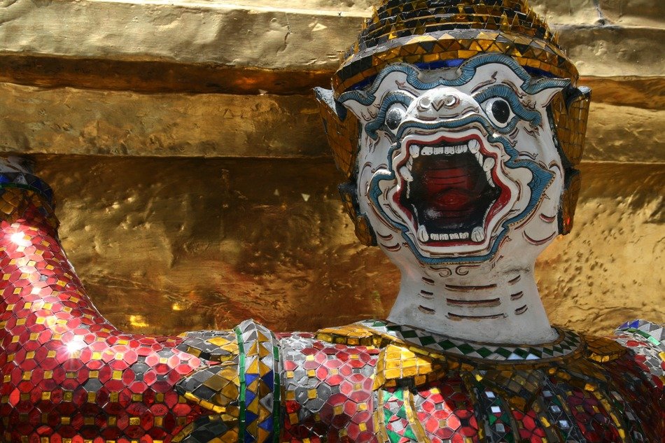 buddhist temple decoration, monster with glare teeth