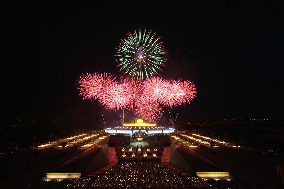 fireworks above phra dhammakaya temple, thailand