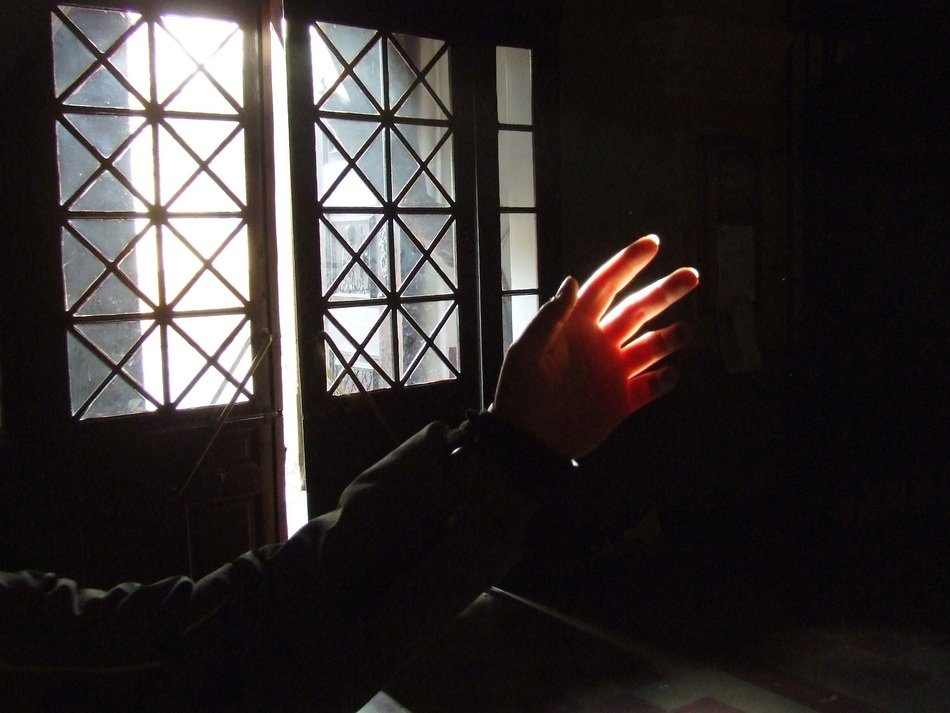 hand on the background of the window in the church