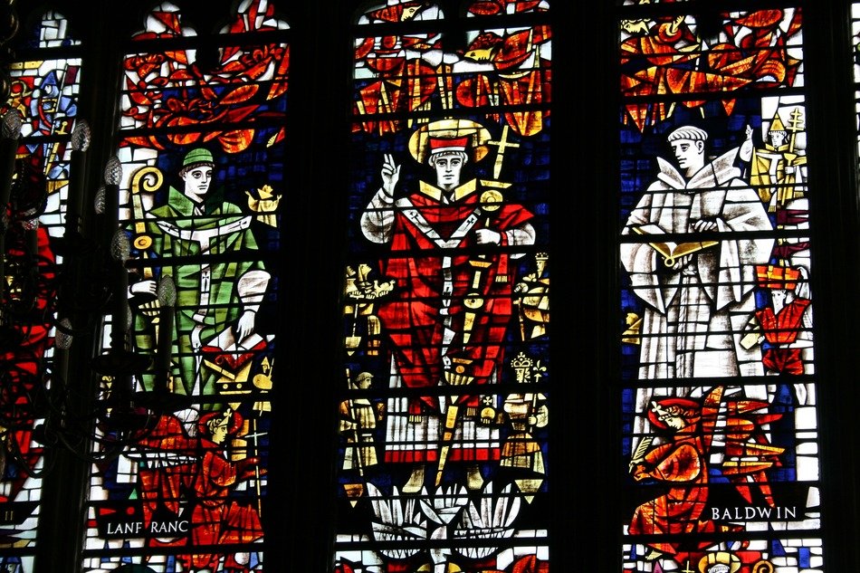 stained glass drawings on a window in a church