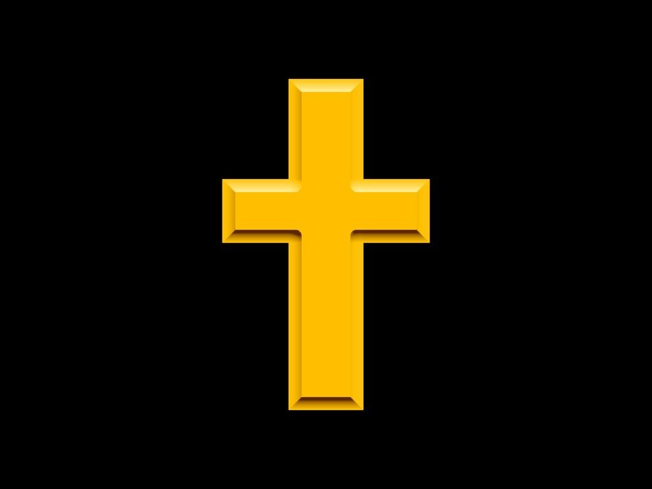 golden cross at black background
