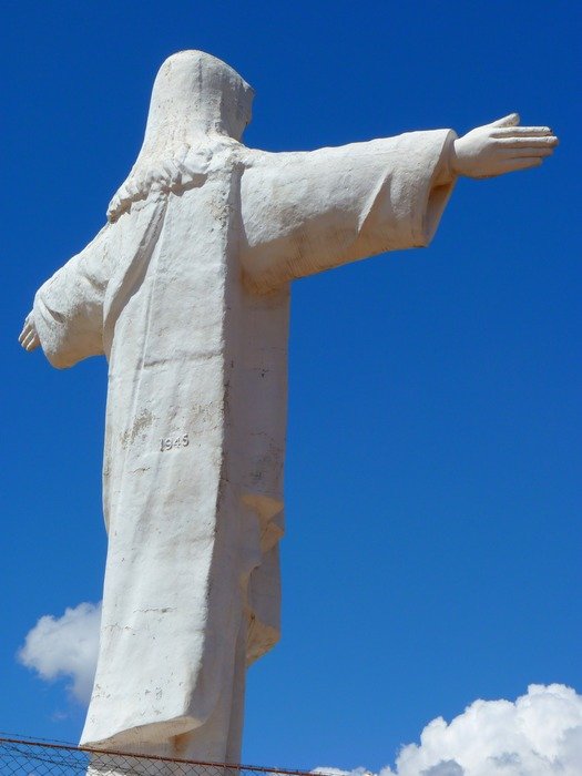 statue jesus against the blue sky