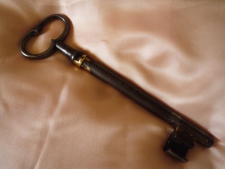 the key to the lock on a silk cushion