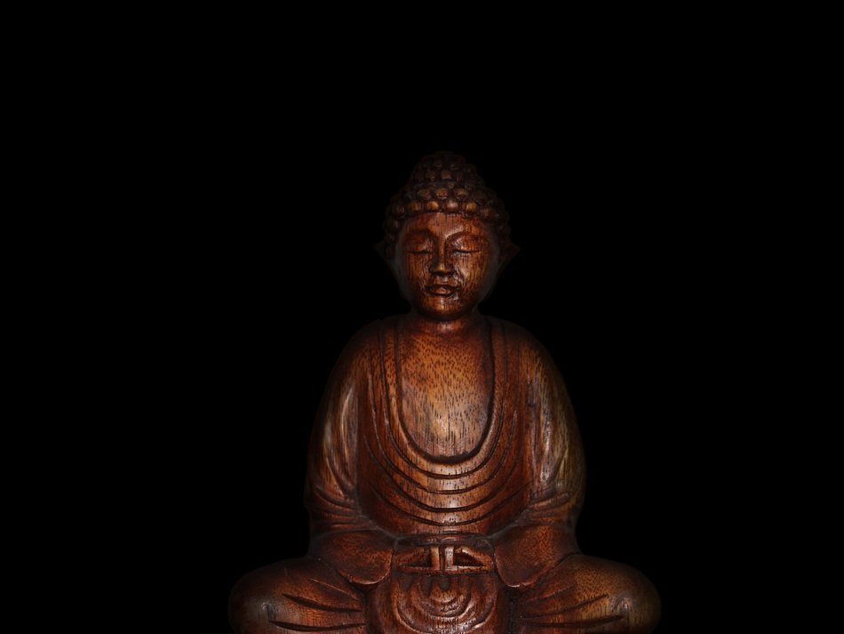 A Buddha statue in a dark place