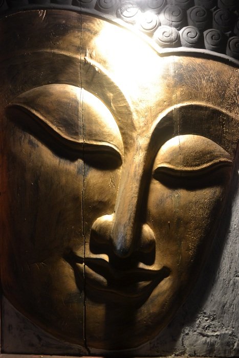 head of buddha in the rays of light