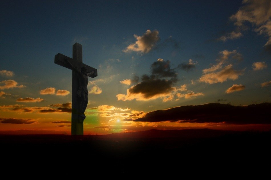 jesus on the cross at sunset