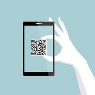 Hand holding QR Code into the phone