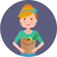 Woman holding paper bag with vegetables