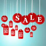 Sale signs and tag hanging in store for promotion shopping