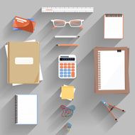 Calculator ruler and paper on an office desk