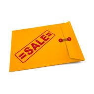 sale stamp on manila envelope