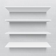 Four white realistic shelves against brick wall