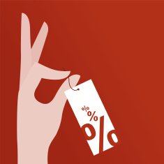 Hand holding price tag