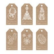 Collection of kraft paper tags with christmas motifs