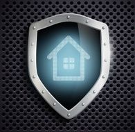 metal shield with the image of house