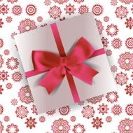 white gift with ribbon and bow