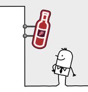 man standing under a wine shop sign