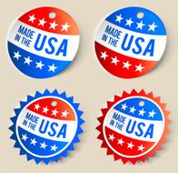 Four ribbon tags with MADE IN THE USA in American colors