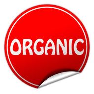 organic round red sticker on white background