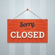 We are sorry closed red sign on a wall