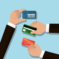 hands with credit cards