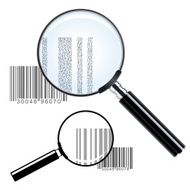 Two magnifying glasses over bar codes