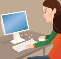 Girl looking at desktop computer screen