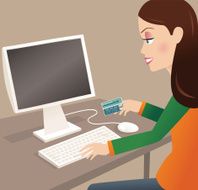 Woman with credit card online shopping