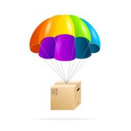 Rainbow parachute with cardboard box on a white