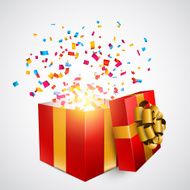 Red gift box with confetti