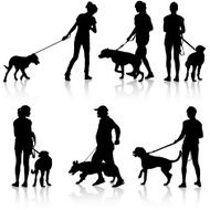 Silhouettes of people and dogs