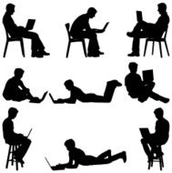 Men sitting at home using laptops