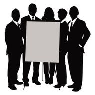 Businesspeople standing behind flip chart