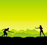 Couple play frisbee