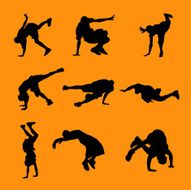 Black and orange breakdancers