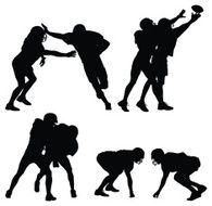 Silhouette of American football players in action