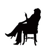 Silhouette of a sitting girl with cigarett