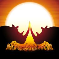Two African Rhinos silhouettes safari against hot sun