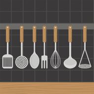 Kitchen utensils weighs on a wall in the kitchen N3