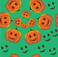 Pumpkins on green backdrop
