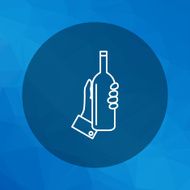 Hand holding bottle
