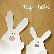 Happy Easter postcard White rabbits on a brown background